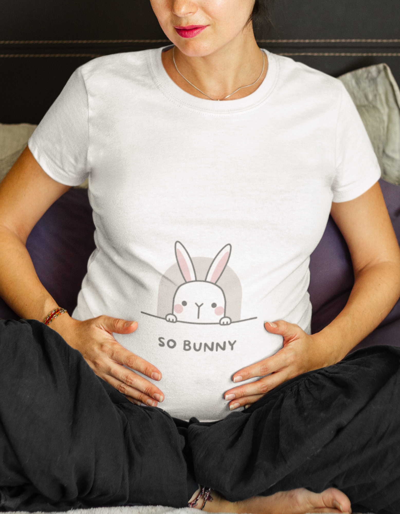 Experience comfort and style with our So Bunny maternity tee. The oversized fit provides ample room for your growing bump, while the adorable bunny design adds a delightful twist. Get your hands on trendy women's graphic t-shirts online at Womanitee.