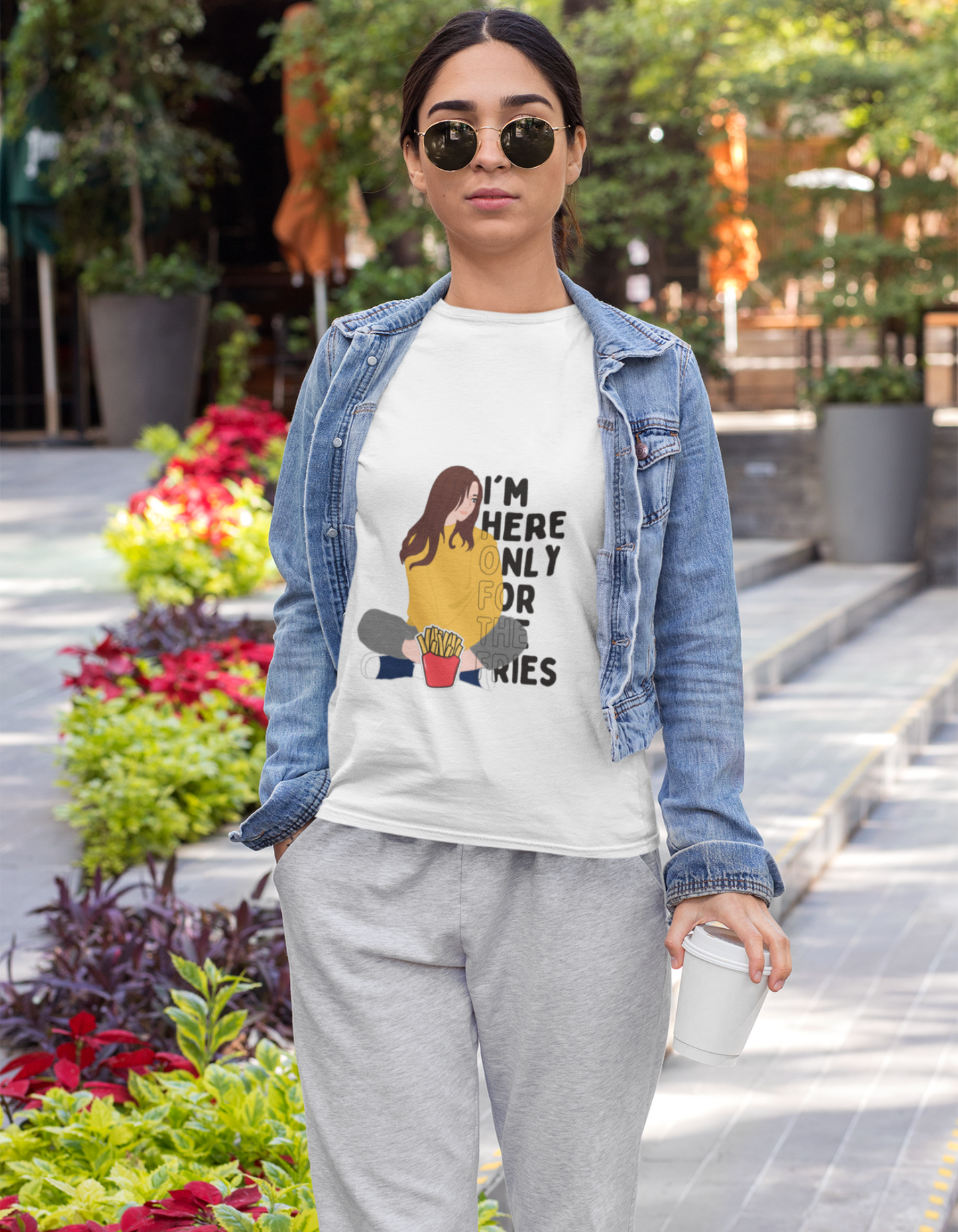 Calling all food lovers! Our white t-shirt celebrates your passion for fries with its playful design. Featuring a woman enjoying a plate of fries, this t-shirt lets you showcase your foodie spirit with a dash of style. Discover the perfect women's t-shirt online at Womanitee.