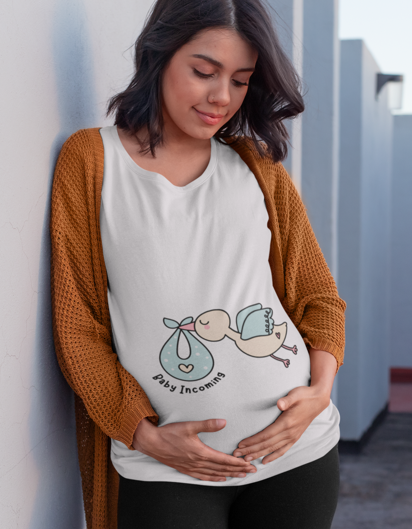 Make a fashionable statement during your pregnancy journey with Womanitee's Baby Incoming Pregnancy T-Shirt. Express your unique style and share your excitement for your little one's arrival. Shop now for women's graphic t-shirts online!