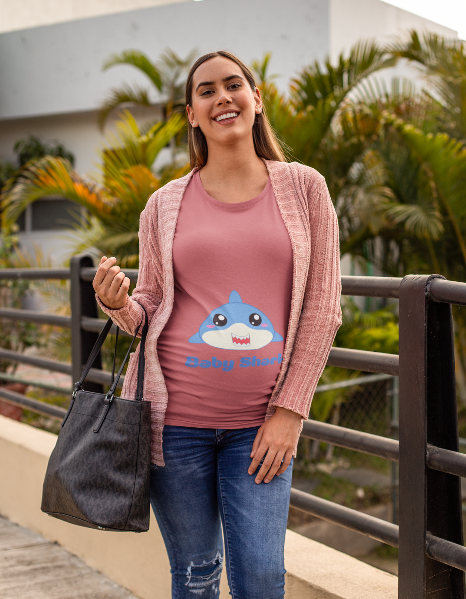 "Discover the perfect pregnancy tee with Womanitee's Baby Shark Pregnancy T-Shirt. Express your excitement for your baby's arrival in style. Shop now for women's graphic t-shirts online in India!"