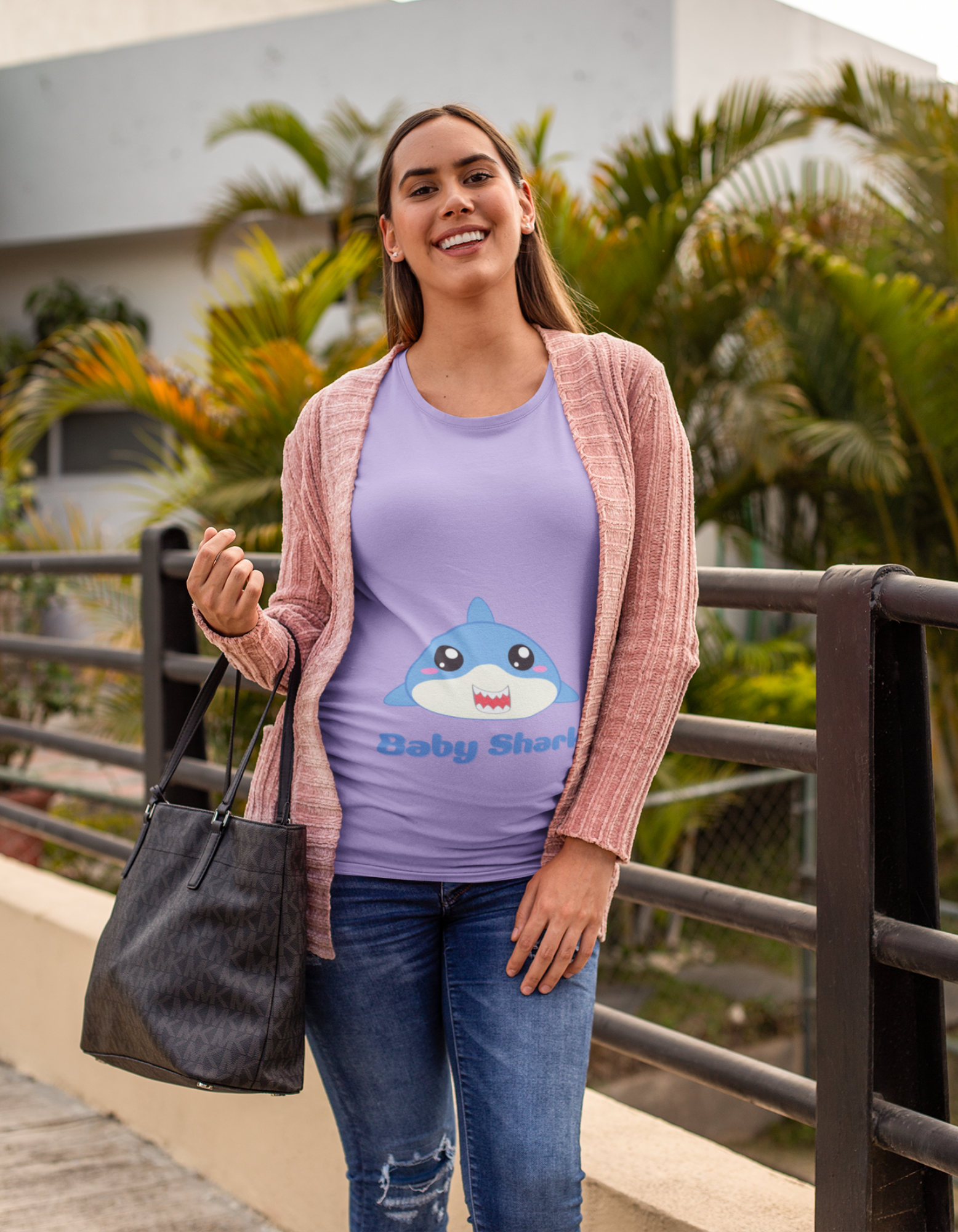 "Embrace the strength and playfulness of a mama shark with Womanitee's Baby Shark Pregnancy T-Shirt. Stay comfortable and fashionable throughout your pregnancy journey. Shop now for women's t-shirts online!"