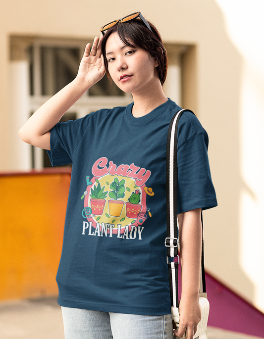 Unleash your inner crazy plant lady with our Navy Blue Oversized T-Shirt. Shop online at Womanitee for trendy women's graphic t-shirts and nurture your love for plants with style and comfort.