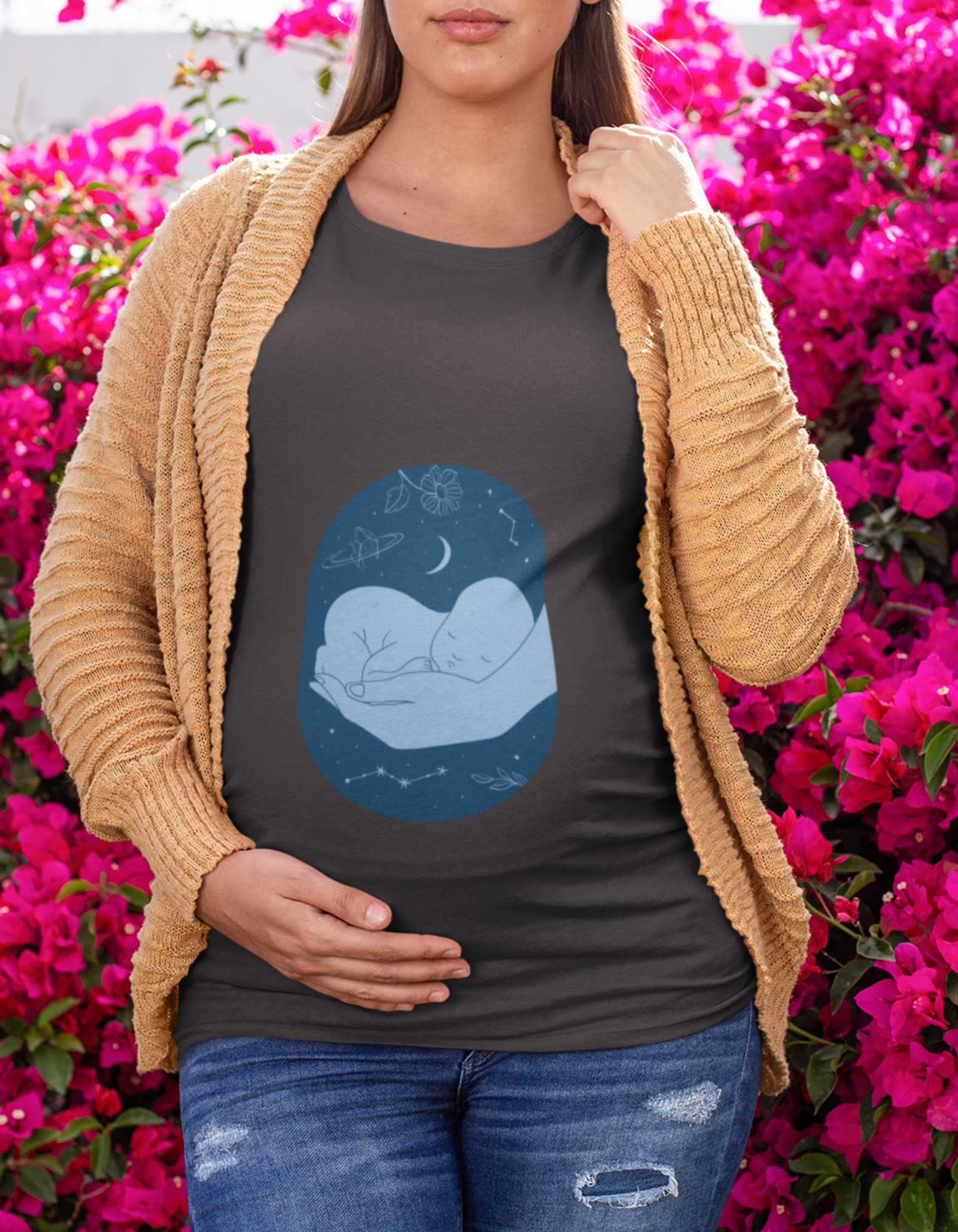 Experience the perfect combination of softness and style with Womanitee's Sleeping Baby Hand Pregnancy T-Shirt. Embrace comfort without compromising on fashion. Shop online in India today!