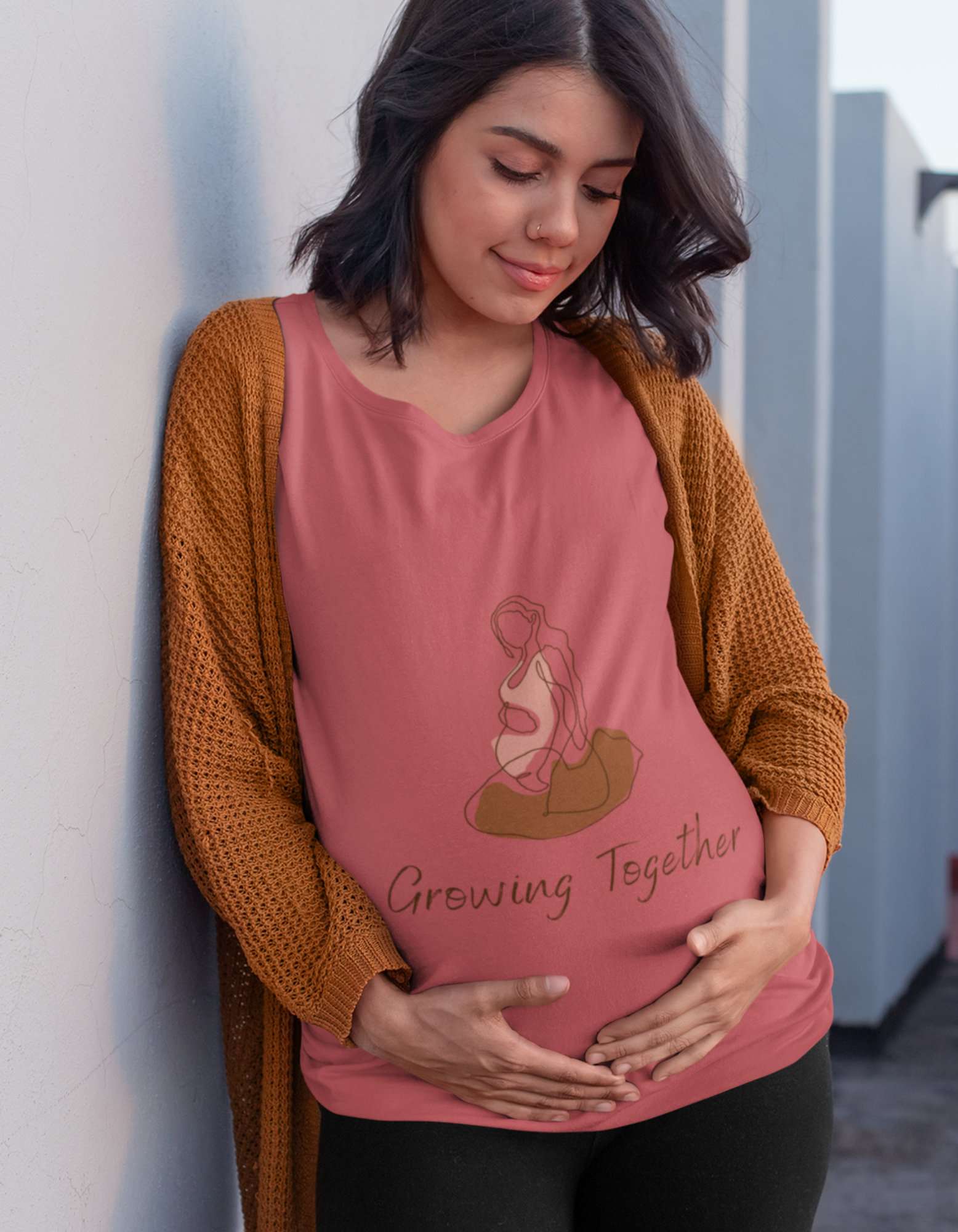 Express your joy and excitement with our oversized pregnancy t-shirt. Its abstract illustration and the phrase "Growing Together" capture the essence of your unique journey. Shop now at Womanitee for women's graphic t-shirts online in India.  Title: "Celebrate Motherhood - Oversized Pregnancy T-Shirt | Womanitee