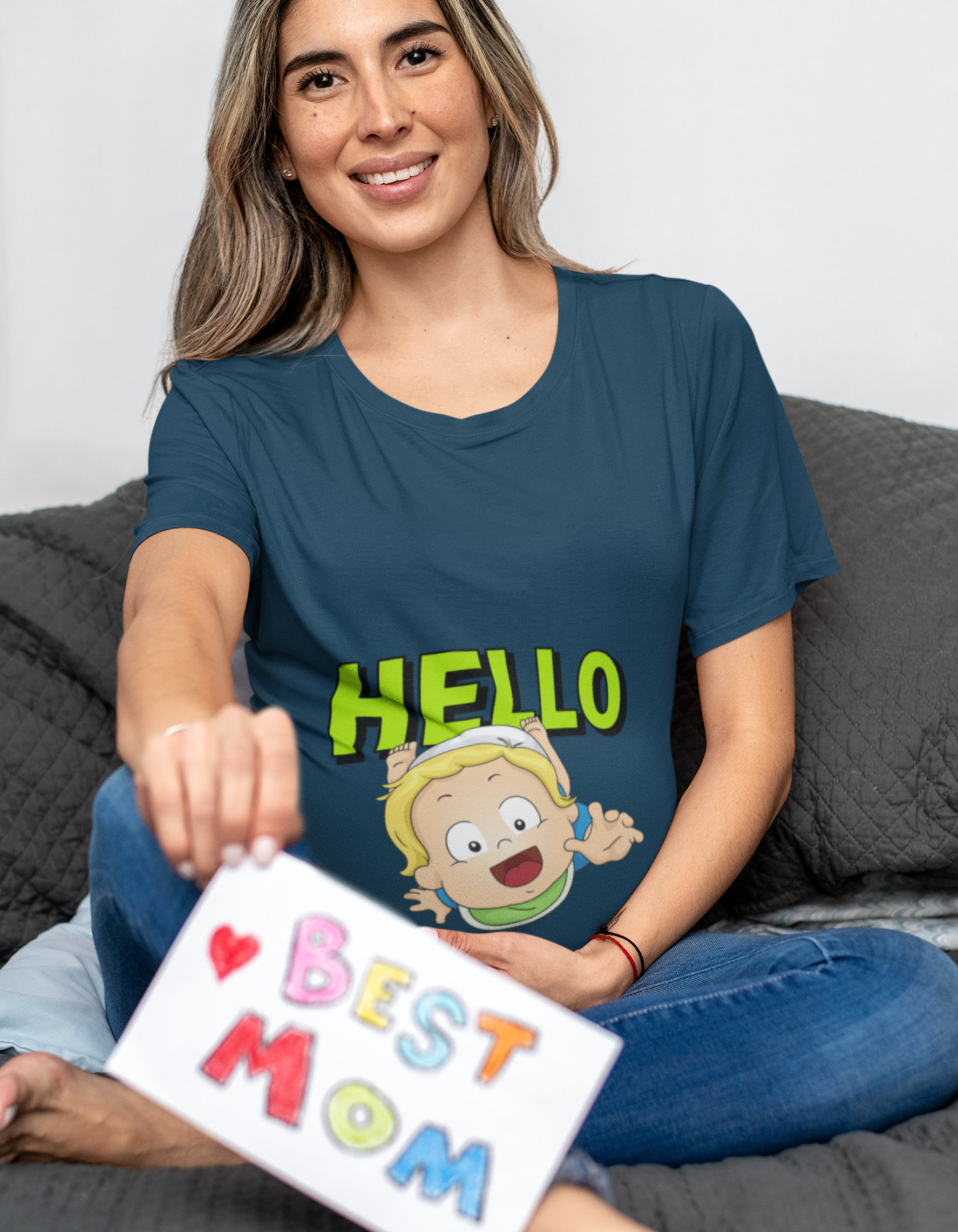 "Express your excitement with our Hello Baby pregnancy tee. The cute baby illustration and playful design make it a must-have for expecting moms. Stay trendy and comfortable throughout your pregnancy. Explore our collection at Womanitee, the ultimate online store for women's t-shirts in India.