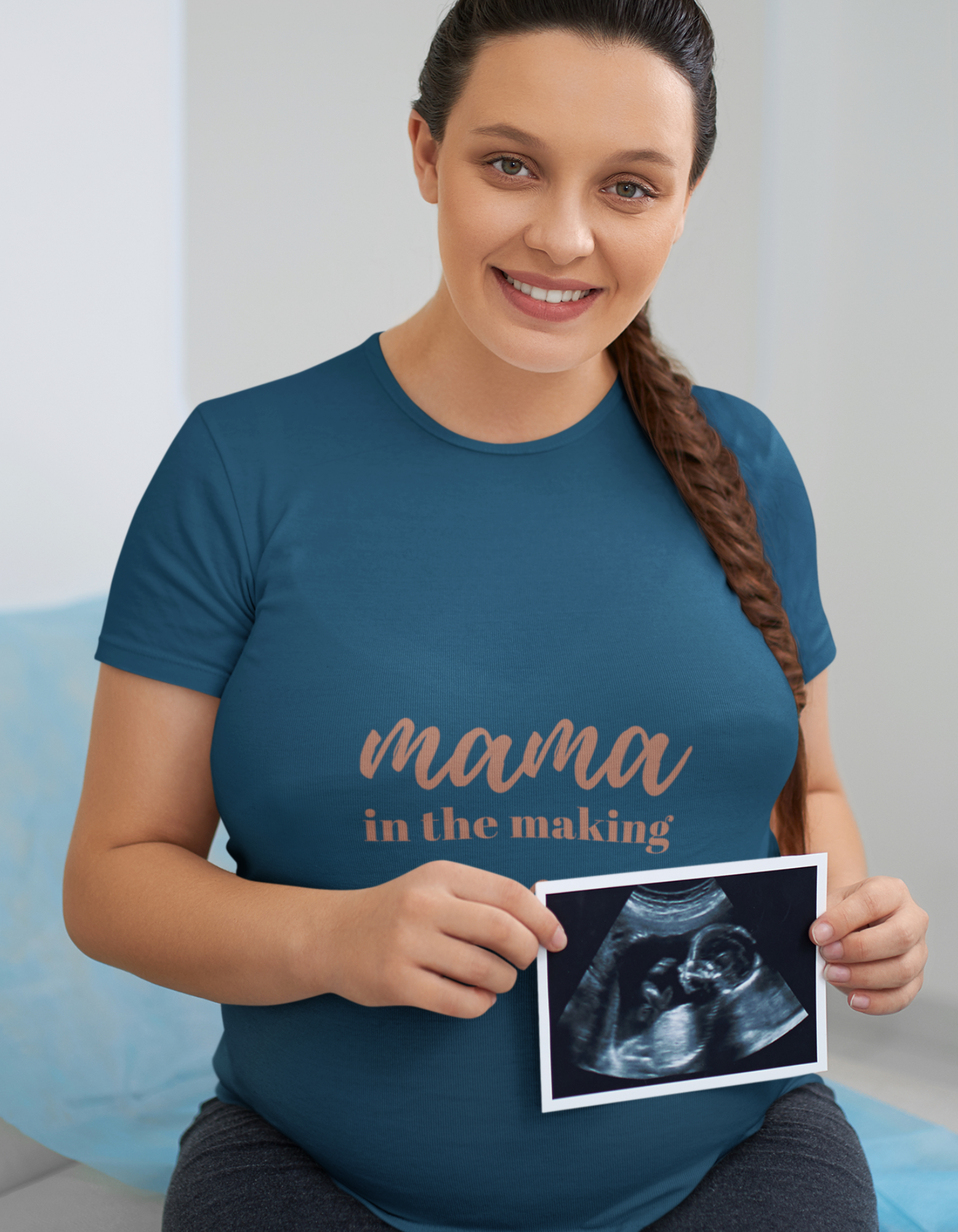 Who says you can't be stylish during pregnancy? Our Mama in Making oversized pregnancy t-shirt combines style and comfort effortlessly. Made from high-quality fabric, it ensures a comfortable fit while the 'Mama in Making' and heart sign design adds a touch of flair. Shop now for trendy women's graphic t-shirts online at Womanitee.