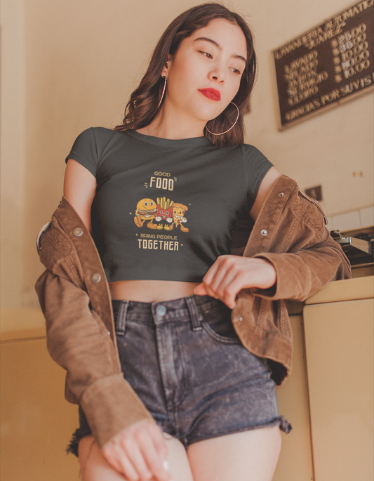 Express your love for good food and fashion with our Foodie Delight Crop Top. This black crop top showcases a burger, pizza slice, and fries design, symbolizing the joy of coming together over delicious meals. Get ready to turn heads with this unique and stylish piece.