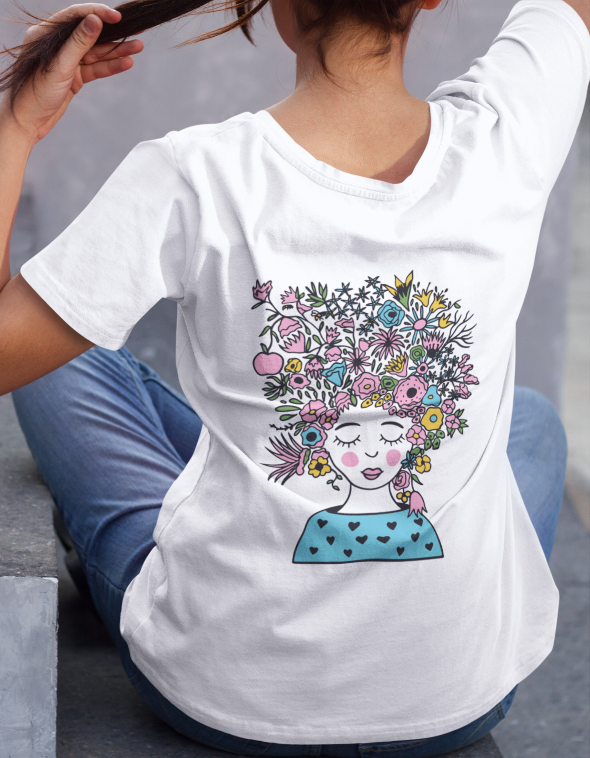 Embrace the beauty of nature with our White Floral Girl Oversized T-Shirt. Shop online at Womanitee for trendy women's graphic t-shirts and let your fashion sense bloom alongside the vibrant leaves and flowers.