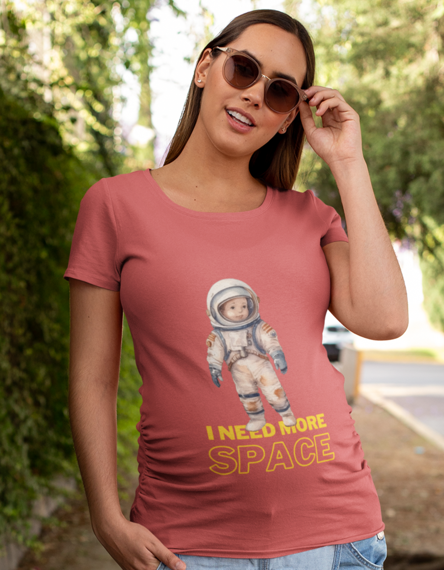 Embrace your stellar journey with our Cosmic Cutie oversized pregnancy t-shirt. Featuring a baby in an astronaut suit and the playful phrase 'I need space,' this t-shirt combines comfort and celestial style. Shop now at Womanitee, the destination for women's graphic t-shirts online in India.