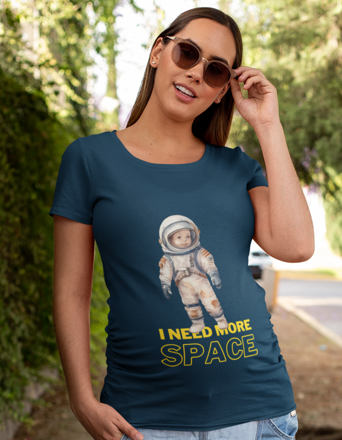 Launch your maternity fashion to new heights with our Cosmic Cutie oversized pregnancy t-shirt. Crafted for comfort and style, it features a baby in an astronaut suit and the playful message 'I need space.' Explore Womanitee's women's graphic t-shirts online in India and embrace your stellar journey.