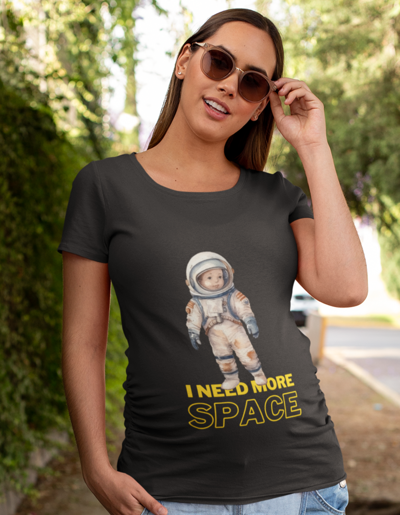 Add a touch of celestial charm to your maternity wardrobe with our Cosmic Cutie oversized pregnancy t-shirt. The adorable baby in an astronaut suit and the phrase 'I need space' create a playful and stylish look. Shop now at Womanitee, the online destination for women's graphic t-shirts in India.