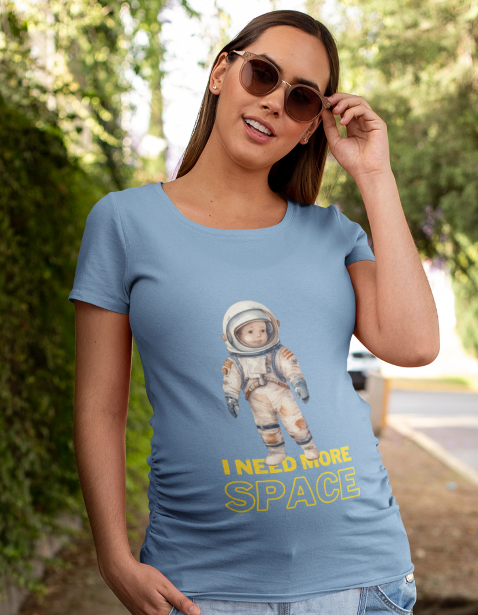 Get cosmonaut-level cuteness with our Cosmic Cutie oversized pregnancy t-shirt. Designed for the modern mama, it showcases a baby in an astronaut suit and the charming phrase 'I need space.' Explore Womanitee's women's graphic t-shirts online collection and express your stellar style.