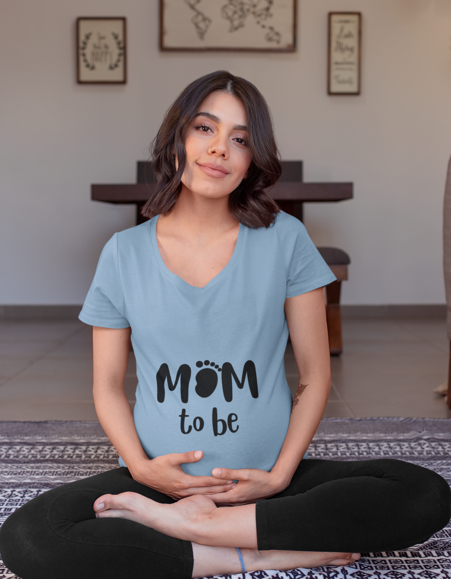 Celebrate your motherhood journey with our modern maternity t-shirt. The creatively designed 'mom' with a baby footprint adds a playful touch to your wardrobe. Stay comfortable and stylish during pregnancy. Visit Womanitee for women's t-shirts online in India.