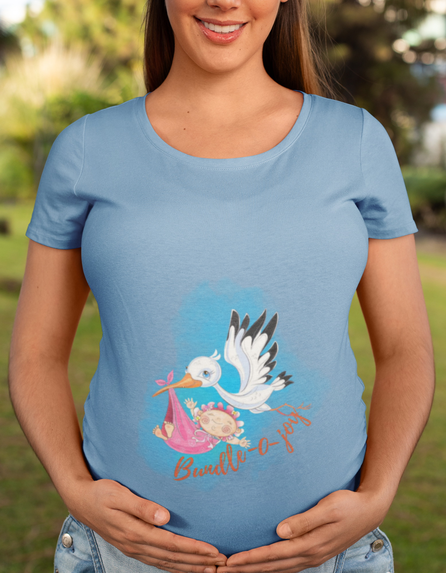 Stay comfortable and stylish throughout your pregnancy with our Bundle of Joy t-shirt. The adorable bird carrying a baby design brings a playful charm, while the oversized fit provides room for your growing bump. Shop now at Womanitee for trendy maternity wear.