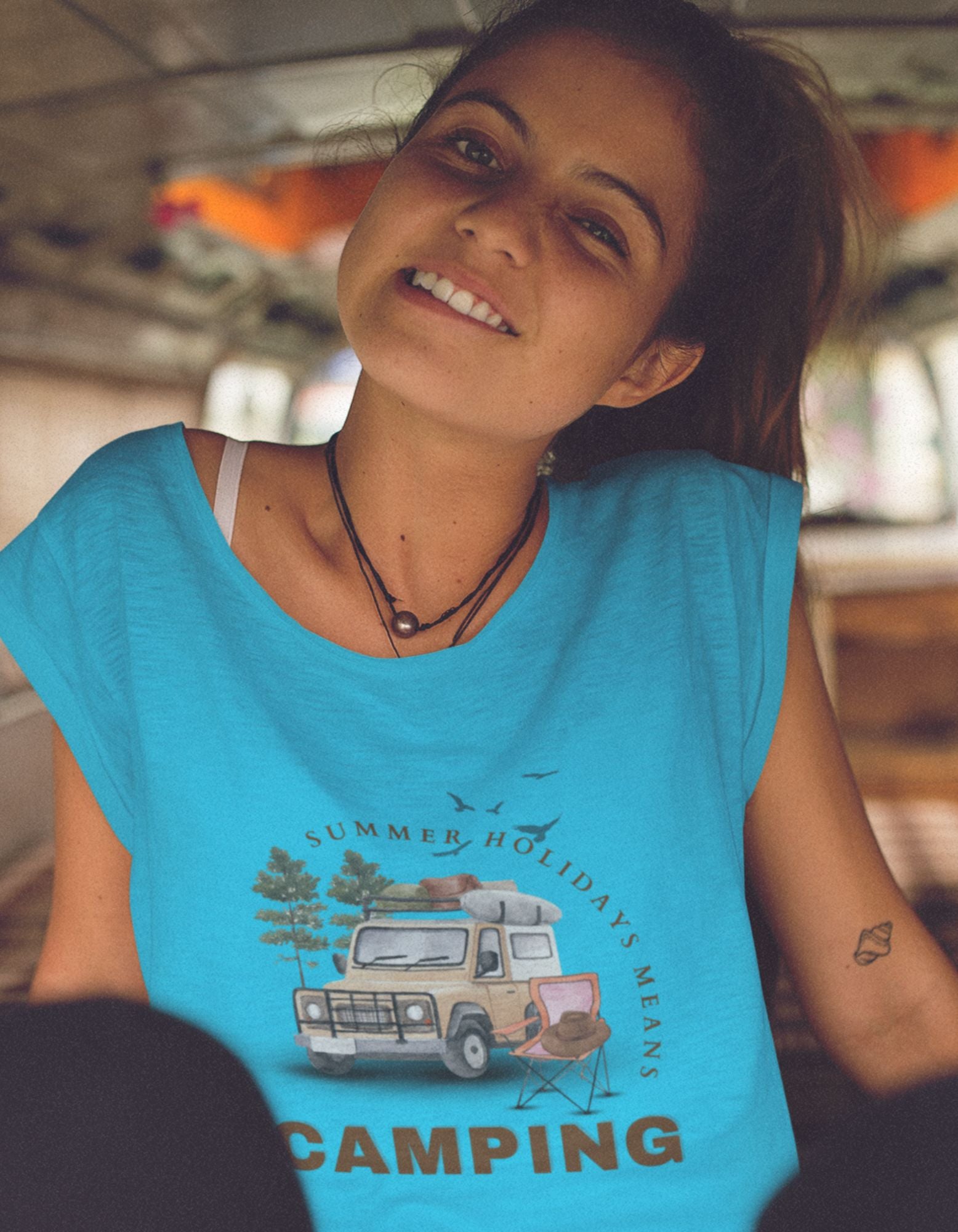 Celebrate the beauty of nature with our Women's Sky Blue Camping Crop Top. Designed with a charming camping illustration and the phrase 'Summer Holidays Means Camping,' this crop top is a must-have for outdoor lovers. Discover Womanitee's collection of women's t-shirts online and embrace the camping spirit.