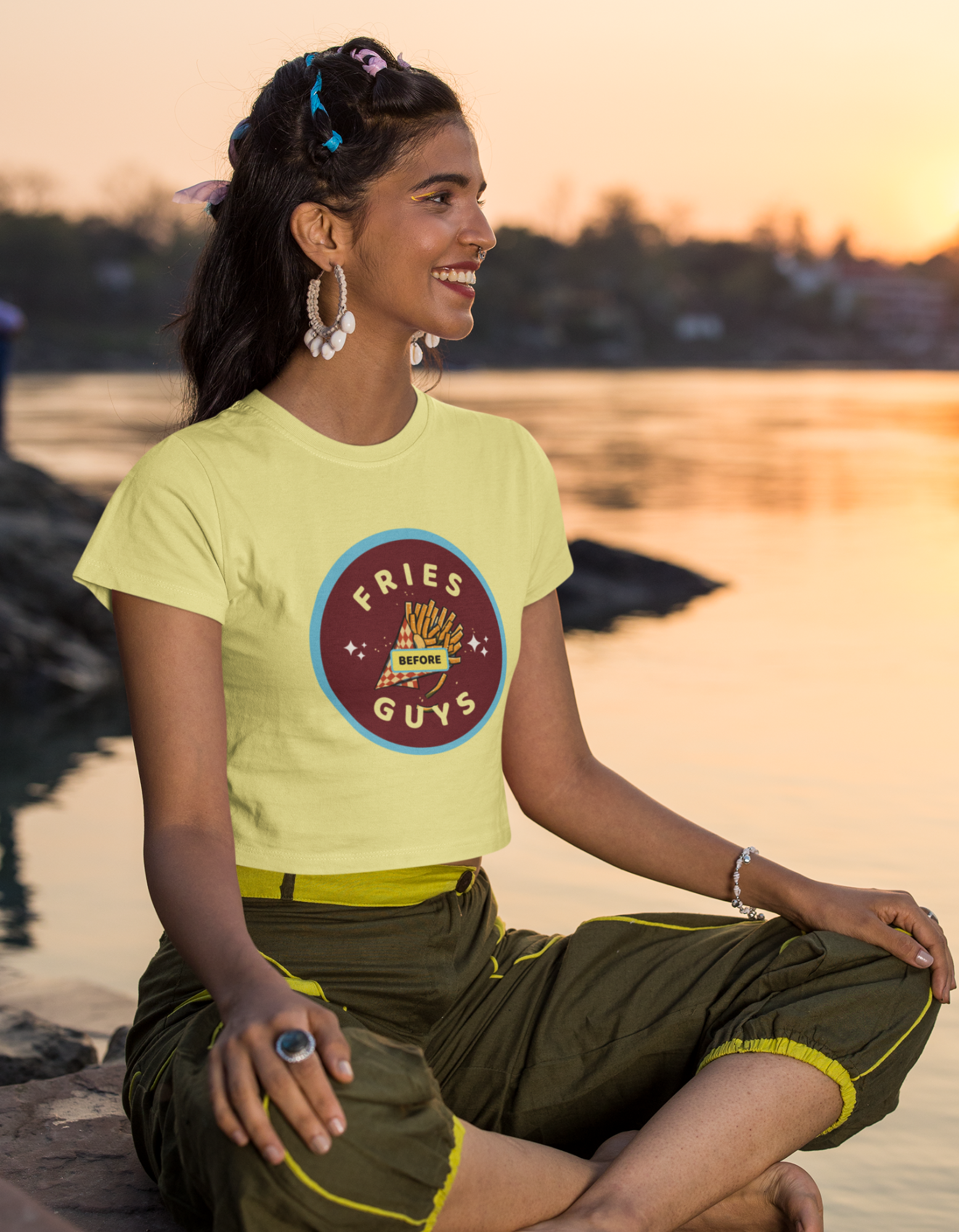 Women's Butter Yellow Crop Top with French Fries Illustration Meta Description: Embrace your love for fries and girl power with our butter yellow women's cotton crop top showcasing a delightful illustration of French fries and the empowering message "Fries before Guys." Order now from Womanitee and wear your independence proudly.