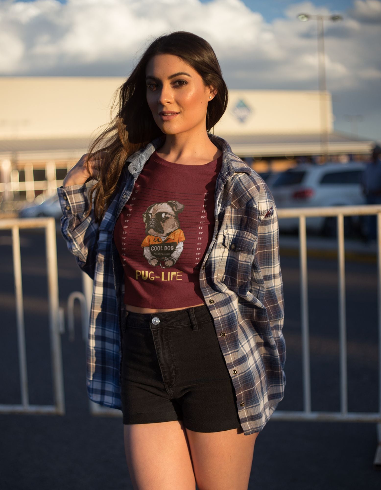 Own your pawsome attitude with our Women's Pug Life Crop Top. This maroon crop top features an adorable pug's mug shot and the hilarious phrase 'Pug Life.' Embrace your inner Pugsta and show off your unique sense of humor!