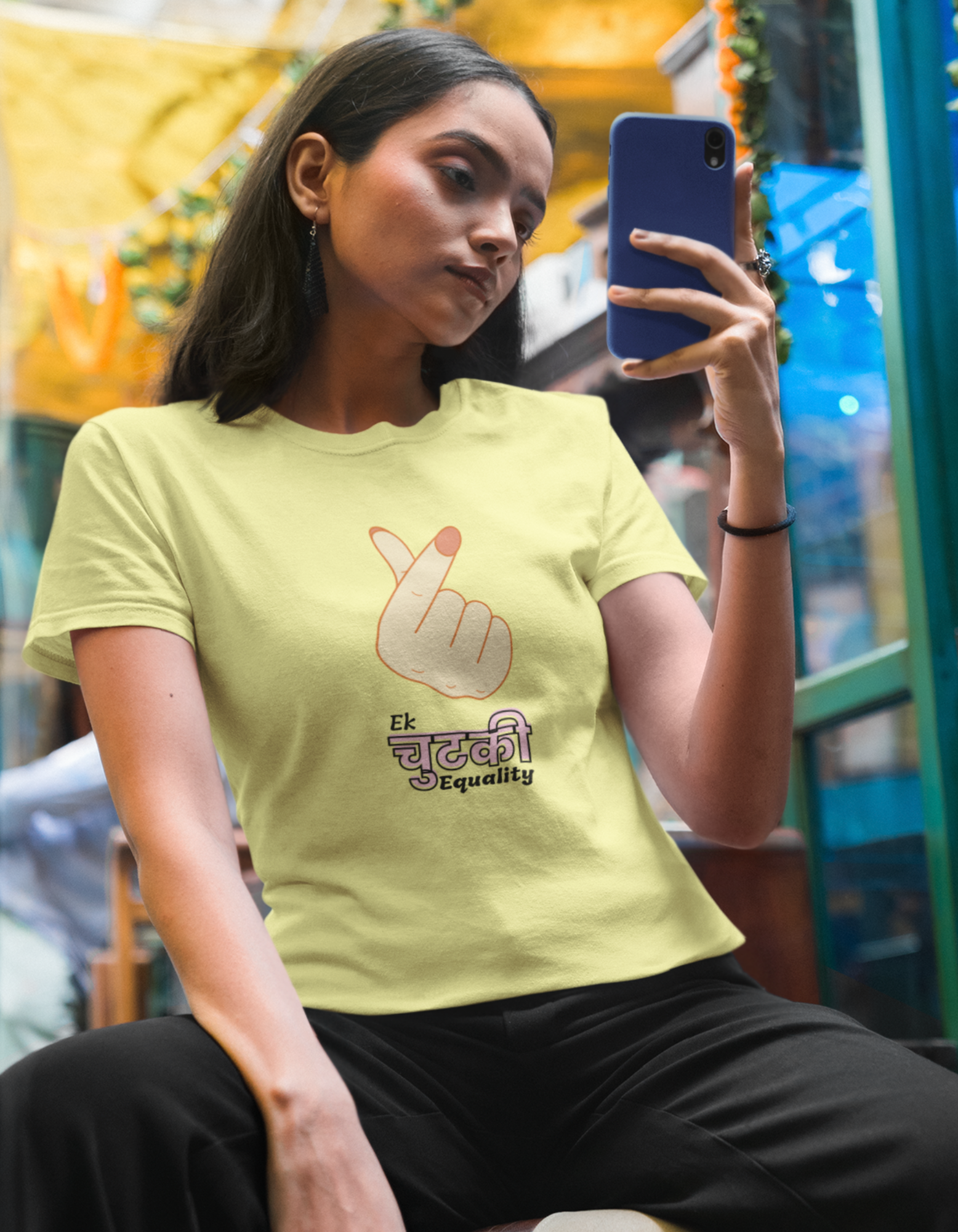 Embrace diversity and spread the message of unity with our butter yellow finger heart t-shirt. Featuring the impactful 'Ek Chutki Equality' message, this tee lets you wear your values. Get yours today!