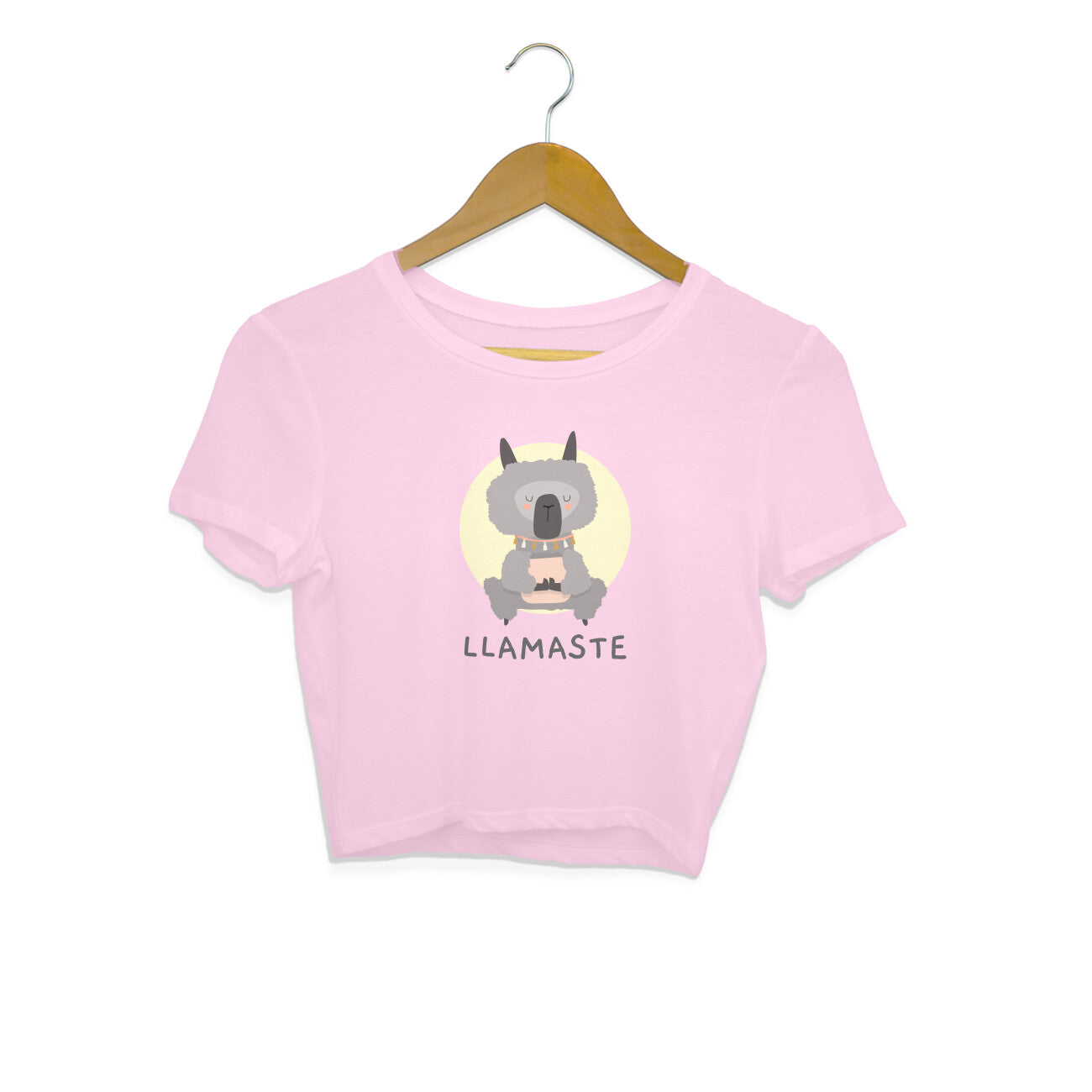 Find your zen and show off your humor with our Womenitee light pink crop top featuring a funny Llama graphic and "Llamaste" message. Perfect for yoga and beyond. Shop now!"