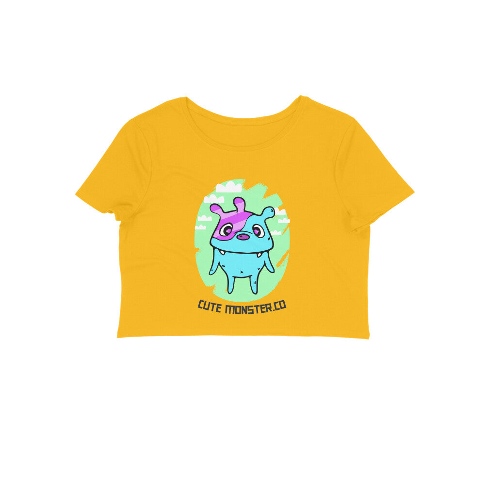 Step into a world of fun and fashion with our Women's Orange Monster Crop Top. This trendy crop top, adorned with a cute monster illustration and the message 'Cute Monster.Co', is the perfect way to showcase your unique style. Shop online at Womanitee for stylish women's crop tops.