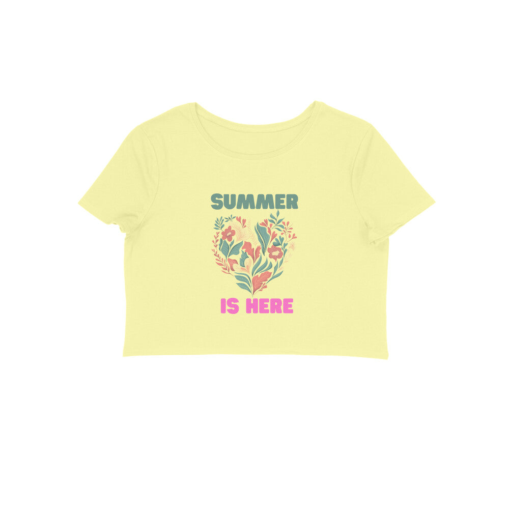 Blossom with style in our Women's Floral Heart Crop Top. This trendy butter yellow crop top showcases a charming floral heart illustration and the phrase 'Summer is Here,' capturing the essence of the modern woman's love for fashionable summer apparel. Shop online at Womanitee for women's graphic t-shirts that exude timeless beauty.