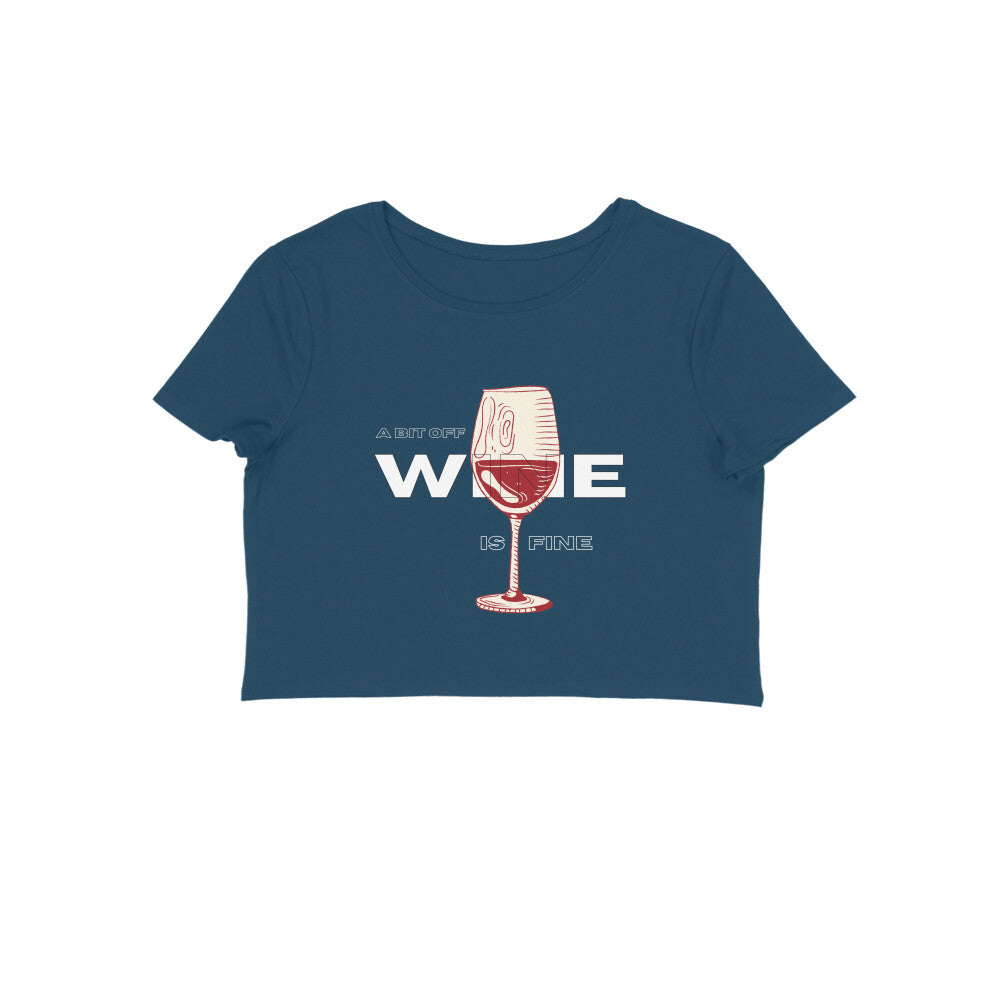 Unwind in style with our Women's Wine Lover Crop Top. In a rich navy blue shade, this crop top features an adorable wine glass illustration and the phrase 'A Bit of Wine is Fine.' Discover Womanitee's range of women's graphic t-shirts online in India and embrace your love for wine with a touch of fashion.