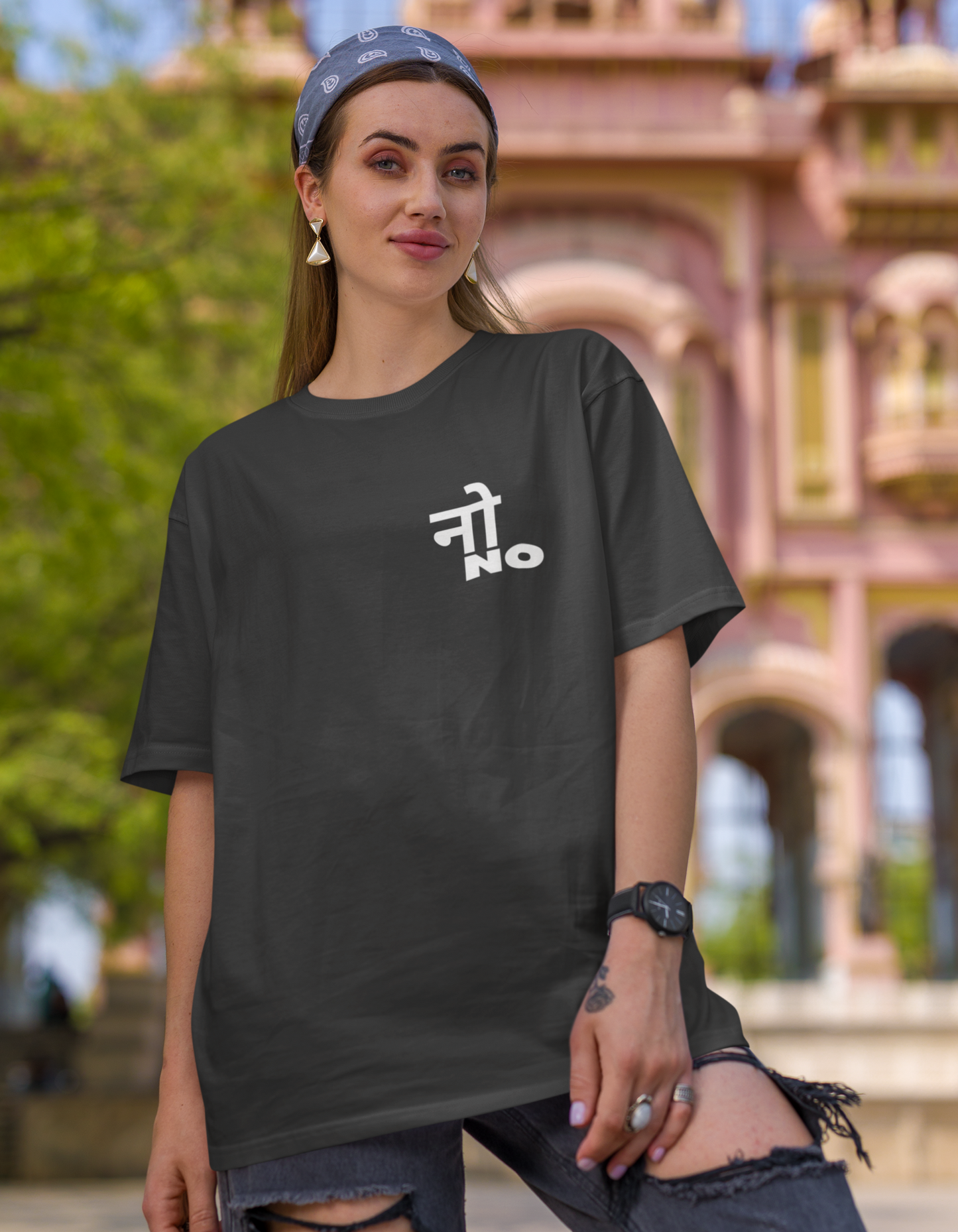 Emphasize the universal understanding of "No" with our black T-shirt. The "नो NO" message speaks volumes, reinforcing the concept that "No" means "no" in any language. Make your statement for consent and boundaries.