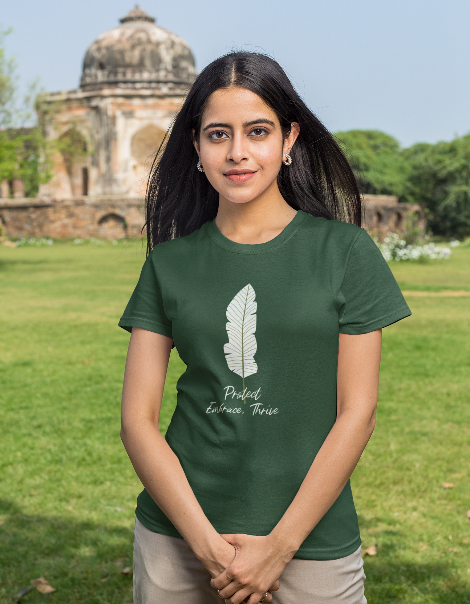 Show your love for nature and personal growth with our olive green t-shirt featuring a leaf outline and the inspiring words "Protect, Embrace, Thrive." Made from comfortable cotton, this tee is perfect for eco-conscious women.