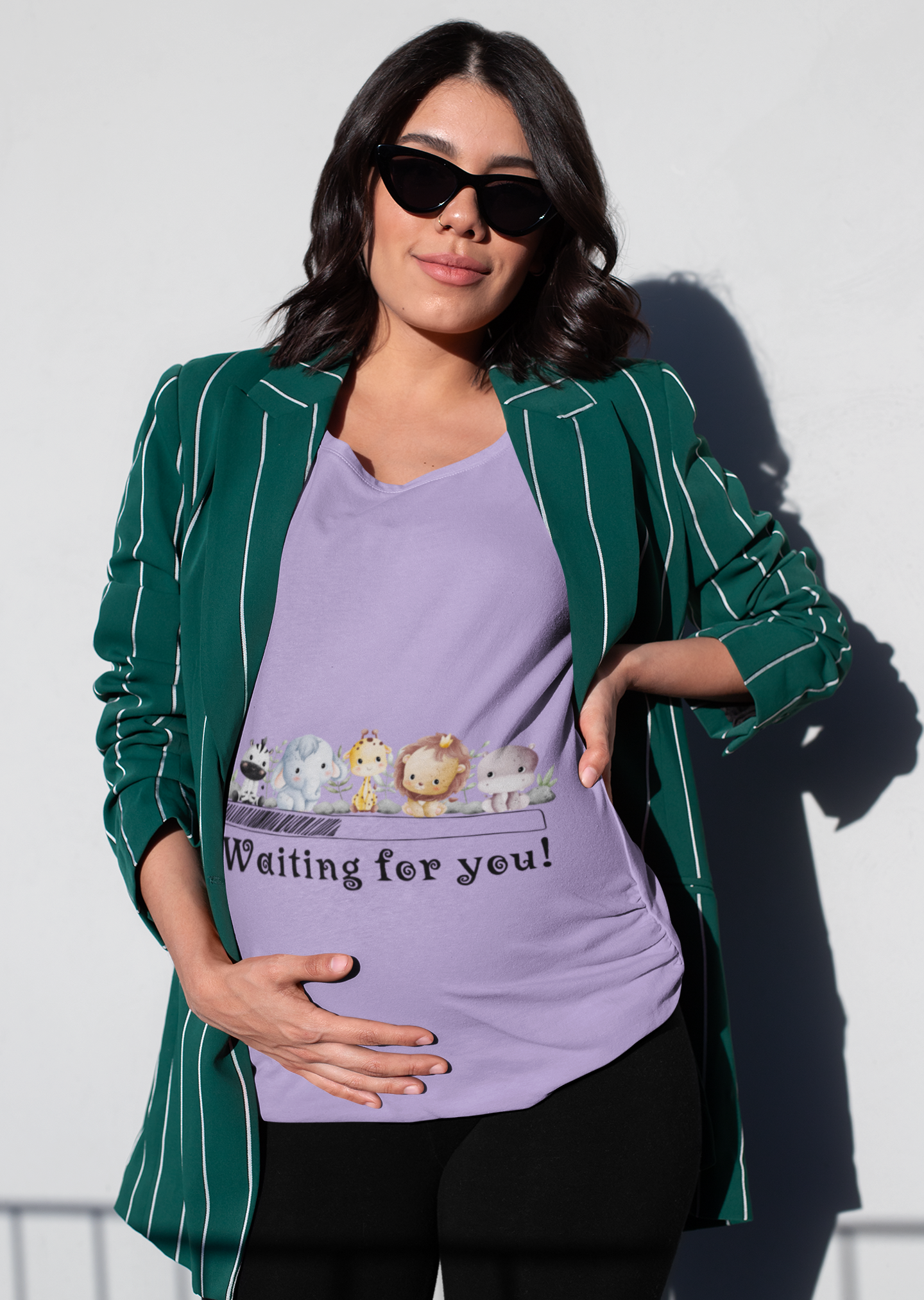 Celebrate the countdown to motherhood with our Waiting for You maternity t-shirt. Featuring a playful design of animal babies and a loading bar, this oversized tee is a perfect blend of comfort and style. Discover a wide range of women's graphic t-shirts online at Womanitee.