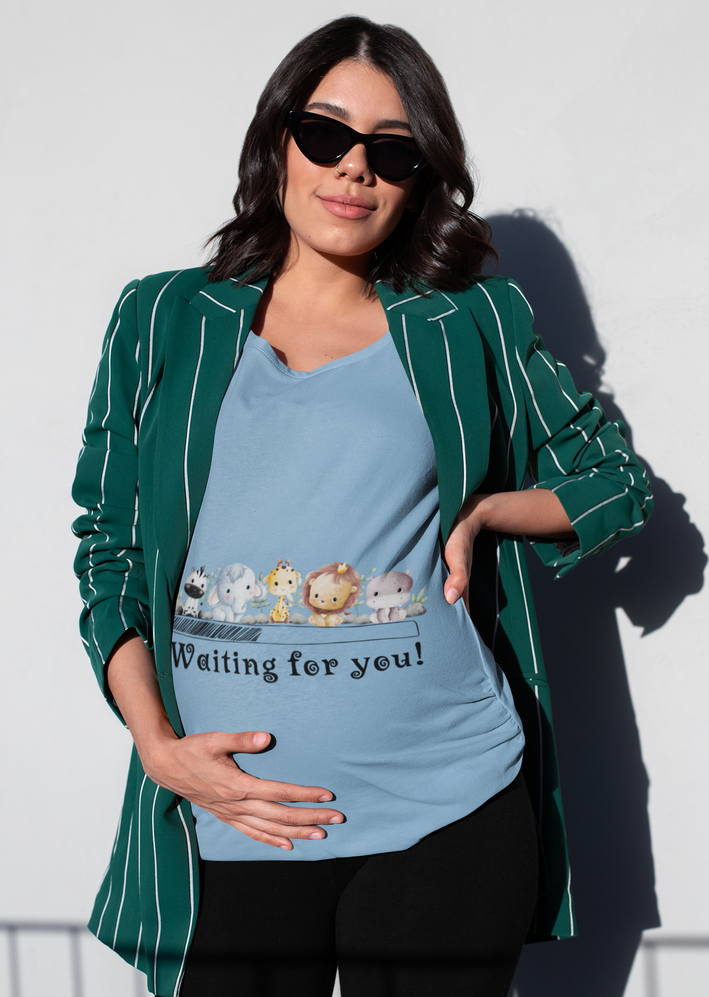 Make a chic and playful statement with our Waiting for You pregnancy t-shirt. With its charming illustration of animal babies and a loading bar, this oversized tee adds a touch of fun to your maternity wardrobe. Shop for trendy women's graphic t-shirts online at Womanitee.