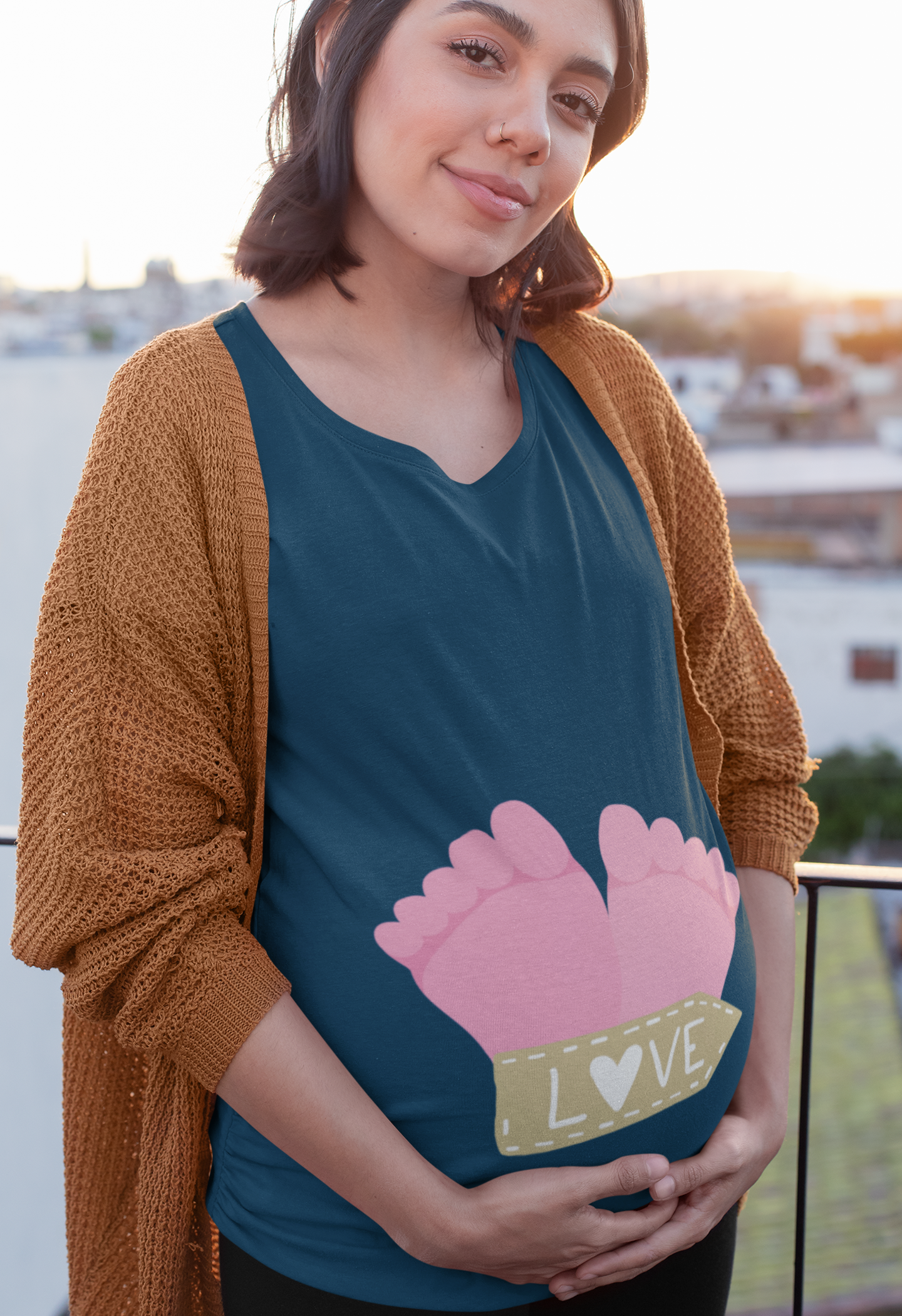 Let your love shine through with Womanitee's Love Foot Pregnancy T-Shirt. Adorned with an adorable illustration, this t-shirt is a perfect symbol of your love and excitement for your baby. Shop for women's graphic t-shirts online!