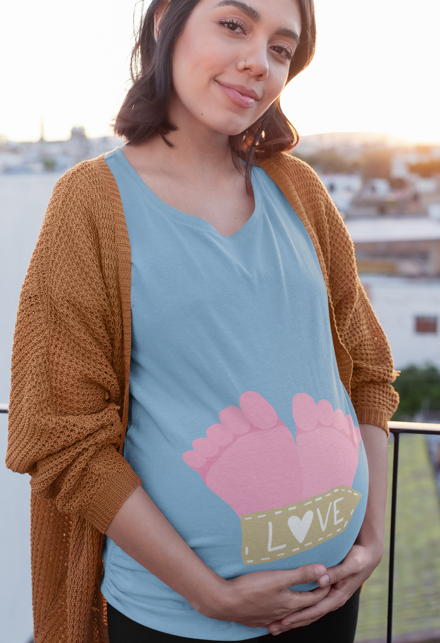 Celebrate the journey of motherhood with Womanitee's Love Foot Pregnancy T-Shirt. Express your love and cherish the precious bond with your baby. Shop online for women's graphic t-shirts and embrace the magic of love!